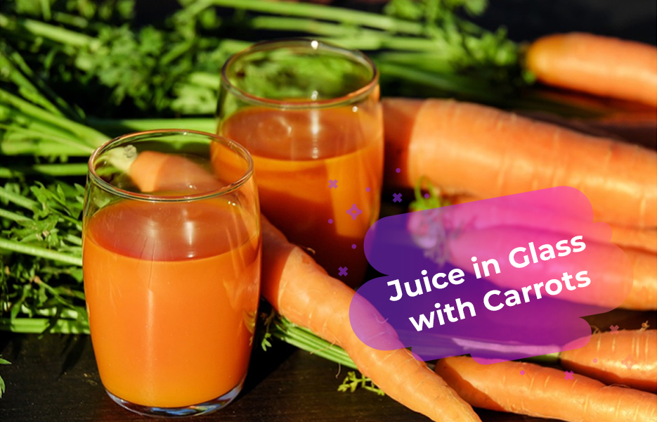 Juice in glass with carrots